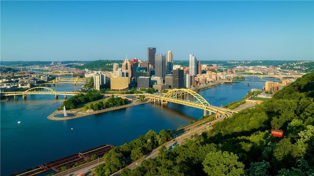 bird's eye view with a view of city and a water view