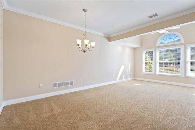 carpeted spare room with visible vents, crown molding, ceiling fan with notable chandelier, and baseboards