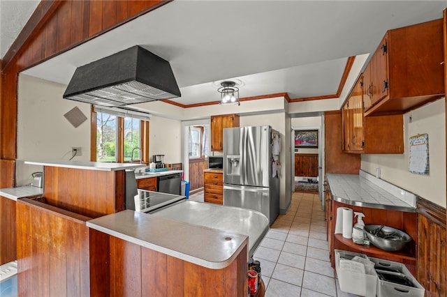 408 N Wade Ave E, Washington Boro, PA 15301 - kitchen with brown cabinets, light tile patterned floors, light countertops, premium range hood, and appliances with stainless steel finishes