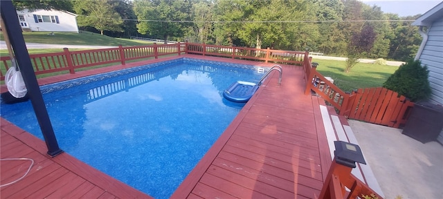 1611 Oneida Valley Rd, Concord Twp, PA 16025 - view of swimming pool with a fenced in pool, a forest view, and a lawn