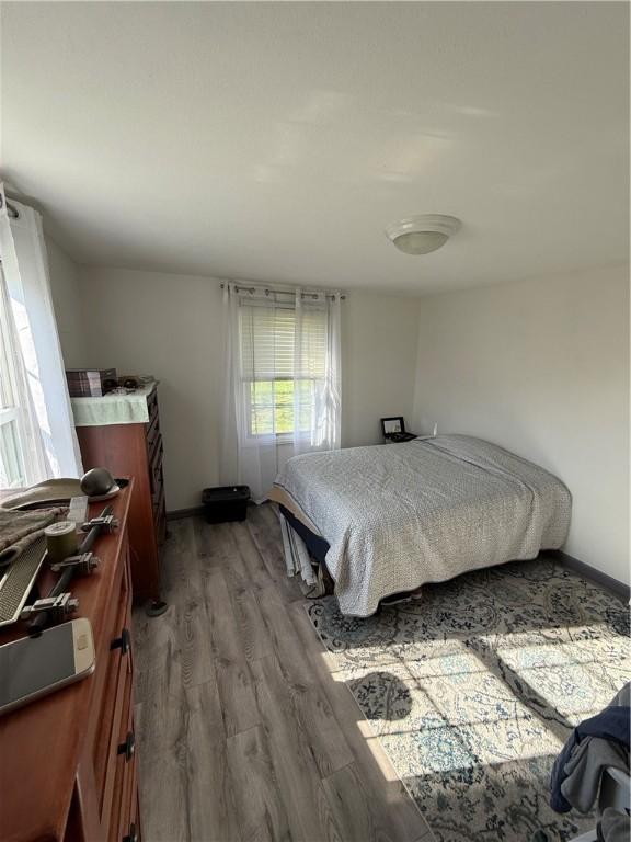 1611 Oneida Valley Rd, Concord Twp, PA 16025 - bedroom with baseboards and light wood finished floors