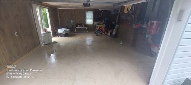 1611 Oneida Valley Rd, Concord Twp, PA 16025 - garage featuring wooden walls and a garage door opener