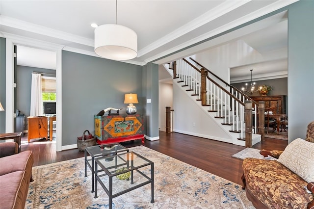 331 Boundary St, Sewickley, PA 15143 - living room with baseboards, ornamental molding, wood finished floors, a notable chandelier, and stairs