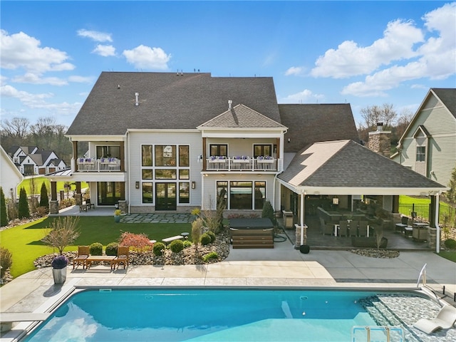 133 Morningside Dr, Cranberry Twp, PA 16066 - rear view of property with a balcony, a patio area, an outdoor pool, and a shingled roof