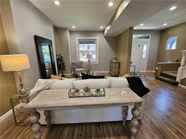 living room with recessed lighting and wood finished floors
