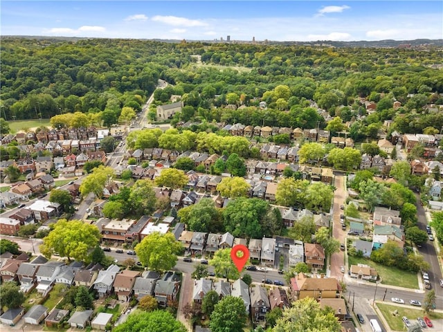 bird's eye view with a residential view and a forest view