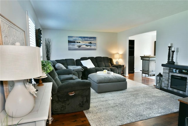 living room featuring dark wood-style flooring