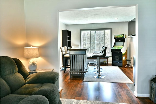 office with baseboards and wood finished floors