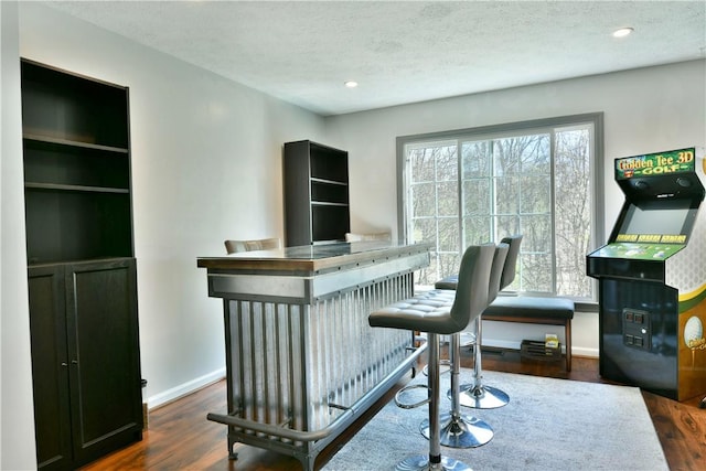 290 Shady Glen Dr, Moon/Crescent Twp, PA 15108 - office space featuring wood finished floors, healthy amount of natural light, a bar, baseboards, and a textured ceiling
