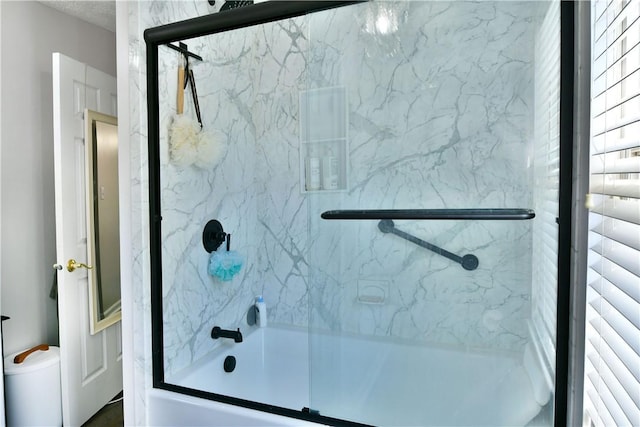 bathroom featuring enclosed tub / shower combo