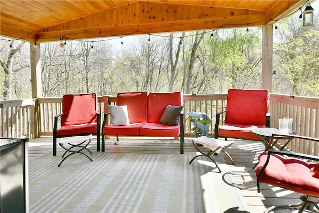 sunroom / solarium featuring plenty of natural light