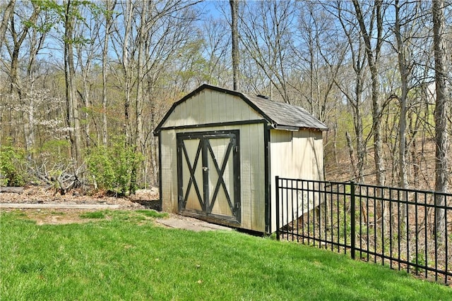 view of shed with fence