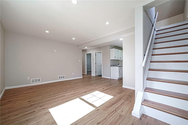 interior space with recessed lighting, visible vents, and baseboards