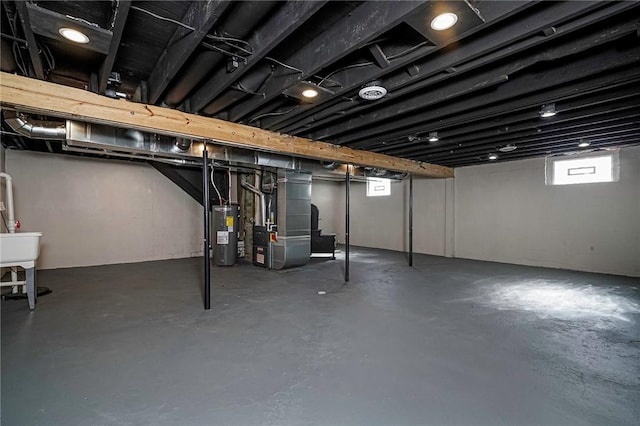 basement with heating unit and water heater