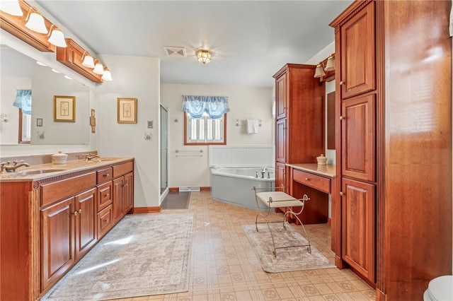 700 Mckinley Ave, City Of Washington, PA 15301 - bathroom featuring visible vents, a stall shower, a bath, and a sink