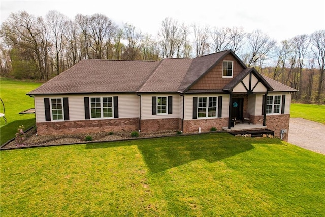 109 Brianna Ln, Oakland Twp, PA 16025 - view of front of home featuring brick siding and a front yard