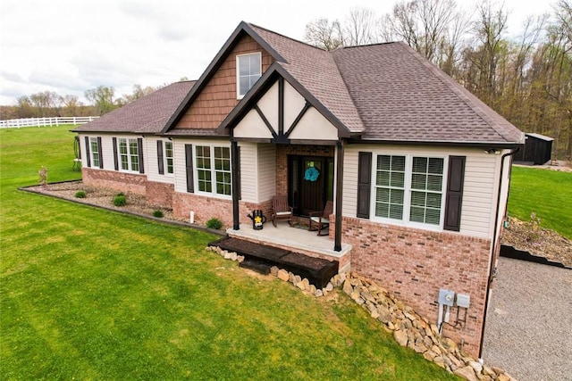 109 Brianna Ln, Oakland Twp, PA 16025 - view of front of home with a front yard, roof with shingles, and brick siding