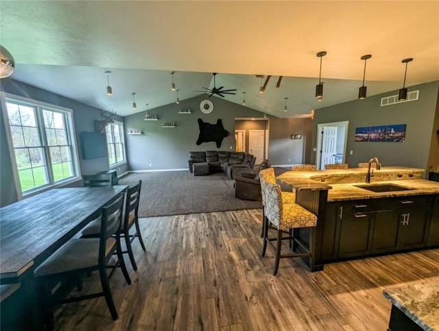 109 Brianna Ln, Oakland Twp, PA 16025 - kitchen with dark wood-style floors, a sink, ceiling fan, pendant lighting, and lofted ceiling