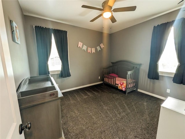 109 Brianna Ln, Oakland Twp, PA 16025 - unfurnished bedroom with a crib, carpet flooring, ceiling fan, and baseboards