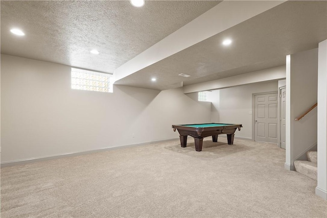 rec room featuring recessed lighting, light carpet, and baseboards