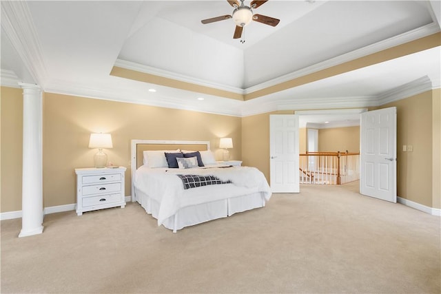 bedroom featuring decorative columns, ornamental molding, and light colored carpet