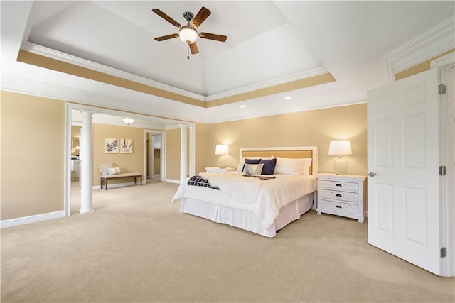 bedroom featuring a raised ceiling, ornamental molding, and light carpet