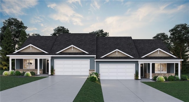 view of front of property with driveway, a porch, a front lawn, and a garage