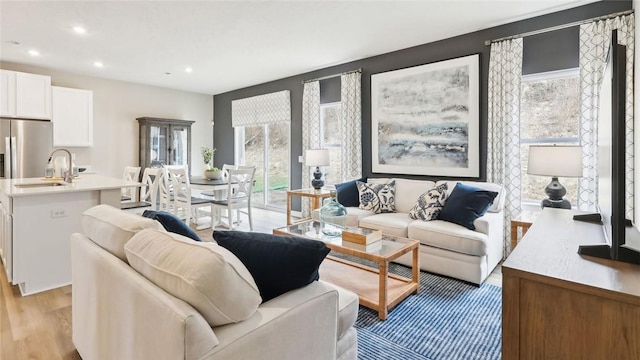 3026 Audrey Dr, Hempfield Twp Wml, PA 15601 - living area with light wood-style floors and recessed lighting