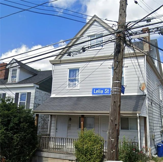 17 Lelia St, Mt Washington, PA 15211 - view of front of home with a chimney, covered porch, and a shingled roof