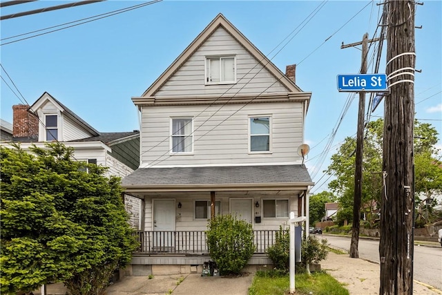 17 Lelia St, Mt Washington, PA 15211 - view of front facade featuring a porch, a chimney, and a shingled roof