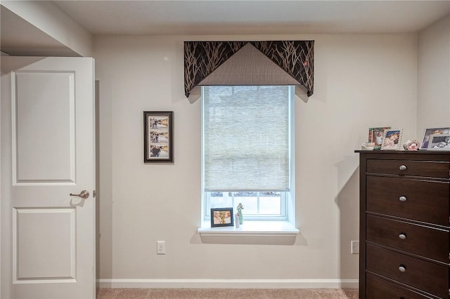 bedroom featuring baseboards