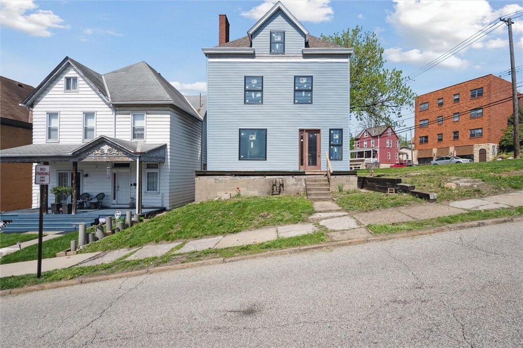 309 Fisk Ave, Avalon, PA 15202 - view of front of house featuring a chimney and covered porch