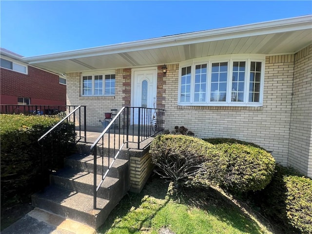 view of front of property with brick siding