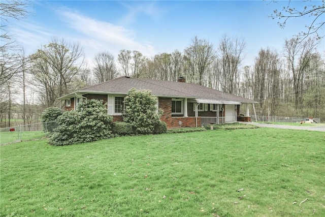 940 Fredonia Rd, Perry Twp Mer, PA 16130 - ranch-style house with a chimney, a porch, brick siding, fence, and a front yard