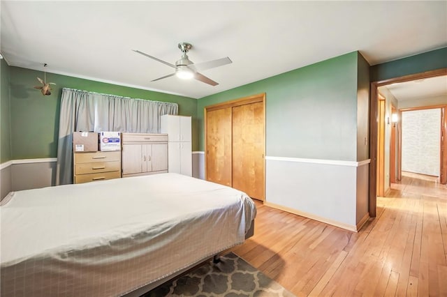 940 Fredonia Rd, Perry Twp Mer, PA 16130 - bedroom with baseboards, light wood-type flooring, ceiling fan, and a closet