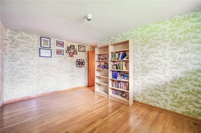 940 Fredonia Rd, Perry Twp Mer, PA 16130 - unfurnished room featuring baseboards, wallpapered walls, and wood-type flooring