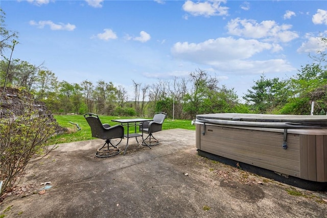 view of patio with a hot tub