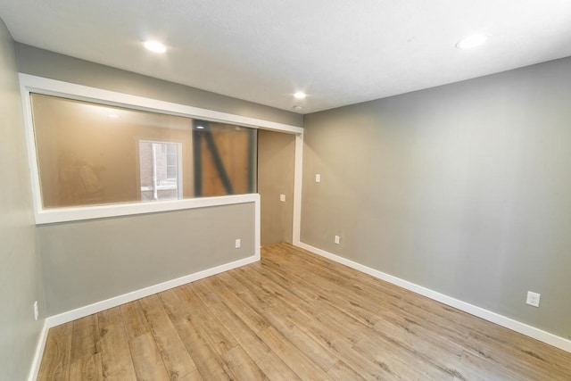 3052 Phelan Way, Polish Hill, PA 15219 - basement featuring wood finished floors, recessed lighting, and baseboards