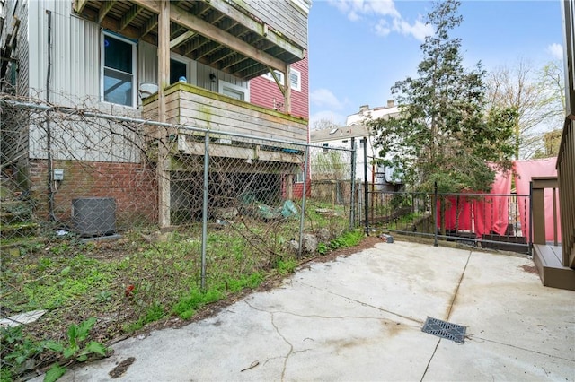 3052 Phelan Way, Polish Hill, PA 15219 - view of property exterior featuring central AC, board and batten siding, and fence
