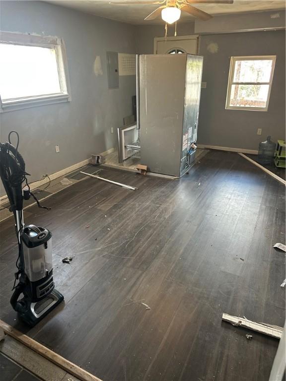 10 Welsh Way S, Side, PA 15203 - unfurnished living room with a ceiling fan, wood finished floors, and baseboards