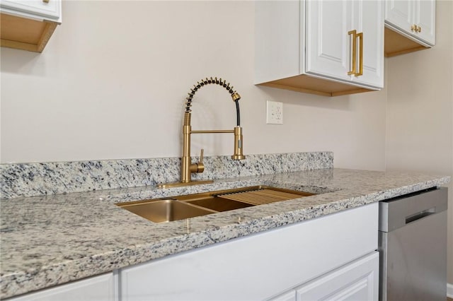 116 Dutchtown Rd, Sewickley Twp, PA 15637 - kitchen with white cabinetry, light stone counters, dishwasher, and a sink