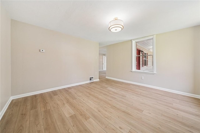 116 Dutchtown Rd, Sewickley Twp, PA 15637 - empty room featuring visible vents, light wood finished floors, and baseboards