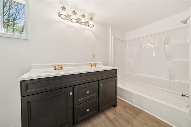 116 Dutchtown Rd, Sewickley Twp, PA 15637 - bathroom with shower / bath combination, double vanity, a sink, and wood finished floors