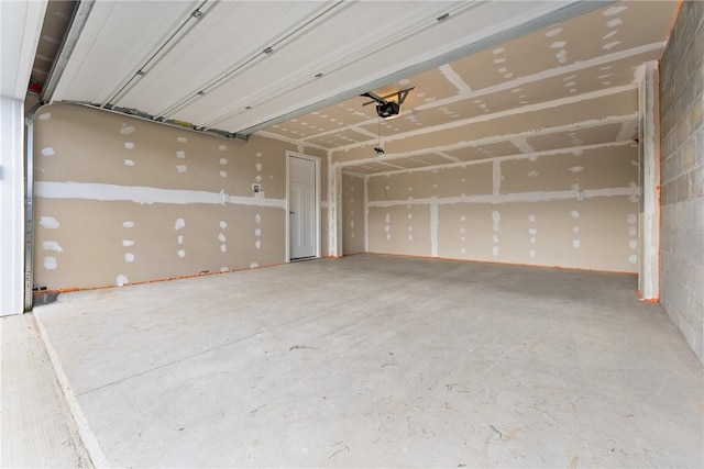 garage featuring a garage door opener