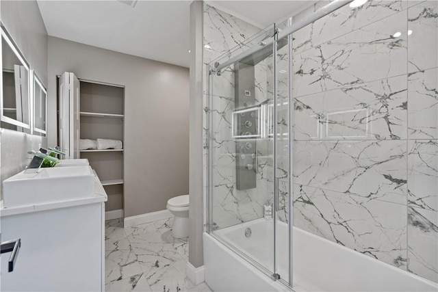 1507 Allegheny Ave, Manchester, PA 15233 - bathroom with bath / shower combo with glass door, baseboards, toilet, vanity, and marble finish floor
