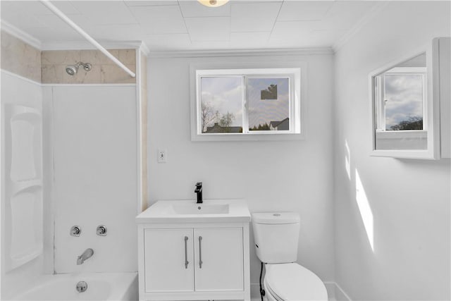 bathroom with a healthy amount of sunlight, toilet, crown molding, and shower / bath combination