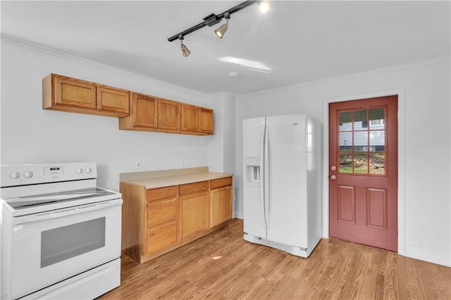kitchen featuring white appliances, crown molding, and light wood-style flooring