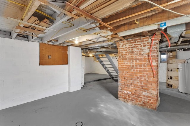 below grade area with stairway and water heater