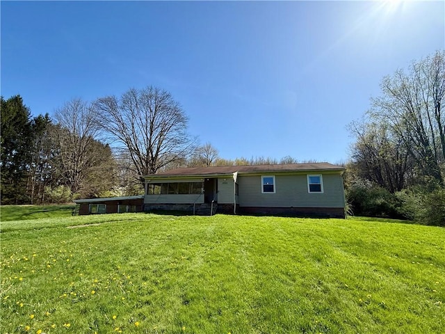 exterior space featuring a lawn