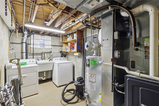 below grade area featuring gas water heater, heating unit, separate washer and dryer, and a sink